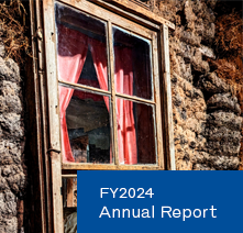 The annual report cover features a window on the sod house